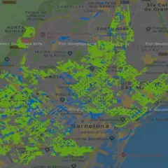 Mapa de Barcelona con áreas de zone bleu resaltadas en verde y azul. Muestra distritos como Gràcia, Eixample y Sant Andreu.