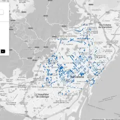 Mapa de Barcelona con puntos azules indicando zonas de aparcar en Montjuïc y alrededores.