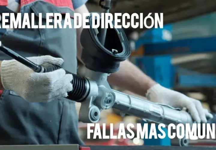 Mecánico revisa cremallera de dirección, una causa común de dirección asistida dura de repente.